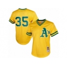 Men's Mitchell and Ness Oakland Athletics #35 Rickey Henderson Replica Gold 1984 Throwback MLB Jersey