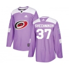 Men's Carolina Hurricanes #37 Andrei Svechnikov Purple Fights Cancer Stitched Hockey Jersey