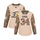 Women Anaheim Ducks #34 Sam Steel Authentic Camo Veterans Day Practice Hockey Jersey