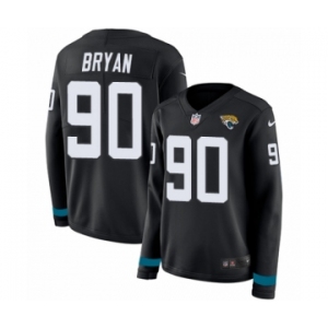 Women's Nike Jacksonville Jaguars #90 Taven Bryan Limited Black Therma Long Sleeve NFL Jersey
